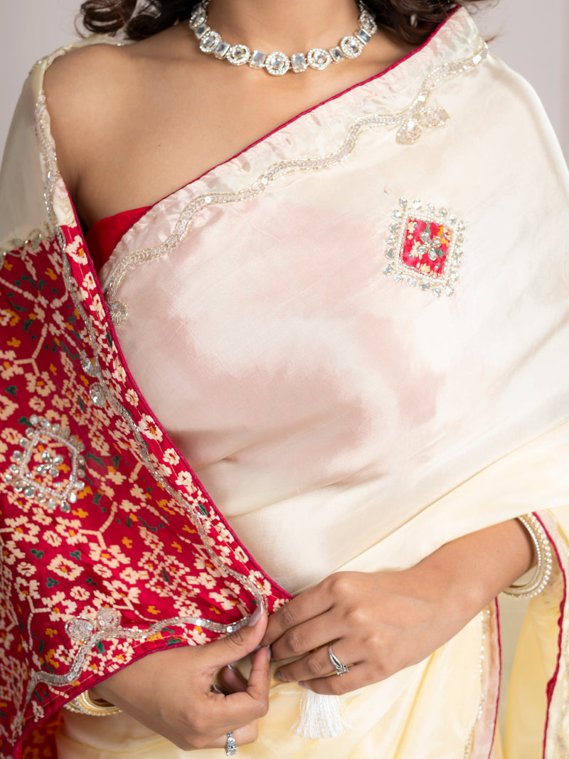 Strawberry Beige Bandhani Patola Silk Saree with Zardozi Work