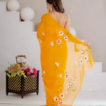 Mustard Yellow Hand Painted Georgette Saree with White Hibiscus Floral Print