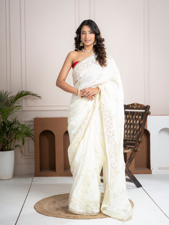 Elegant Ivory Silk Saree with Hand Embroidered Border